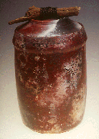 larger picture of tall covered jar